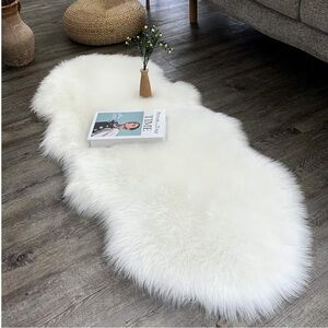 2 White Sheepskin Faux Rugs